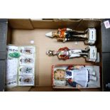 A mixed collection of items to include boxed Chinese glass bottles, two ceramic officer figures,