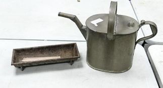 Galvanised Steel Watering Can together with a Cast Iron Chicken Feed Trough