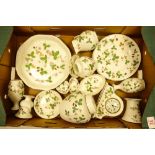 A collection of Wedgwood Wild strawberry to include side plates, vases, ginger jars, mantle clock