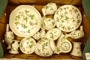 A collection of Wedgwood Wild strawberry to include side plates, vases, ginger jars, mantle clock