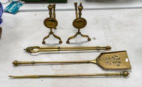 A Victorian Set of Brass Fire Tools to include two andirons, shove, tongs (with exposed screw to