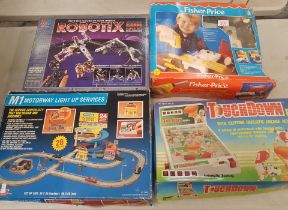 Four Boxed Playsets to icnlude Robotix, Fisher Price, Touchdown Pinball and an Bluebox M1 Motorway