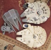 Three Star Wars models to include two Millenium Falcons and one Tie Interceptor (3)