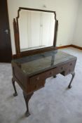 Walnut glass top dressing table with ball and claw feet