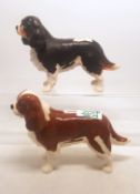 A collection of Beswick dogs to include two King Charles Spaniels, one matt, one gloss (2).