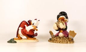 Two Classics Walt Disney figures Scrooge Mcduck and money together with Donald's better self. Both
