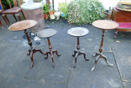 Four occassional circular wine tables