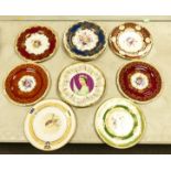 A collection of Crown Staffordshire floral and gilt wall plates together with a Spode Lichfield