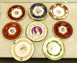 A collection of Crown Staffordshire floral and gilt wall plates together with a Spode Lichfield