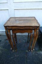 Walnut nest of three tables