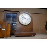 Two 1930s Oak cased mantle clocks and a smoker's cabinet