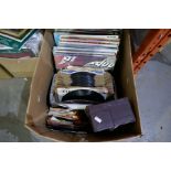 A set of mixed vinyl records, 78s, 45s etc