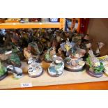 A large selection of resin figures mostly depicting British birds