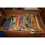 A box of books on various subjects and genres