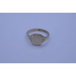 9ct yellow gold signet ring with rounded rectangular panel on stepped shoulders, size L, marked 375,