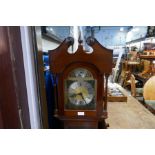 A repro mahogany short cased clock