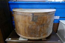 An old pine blanket box of circular form