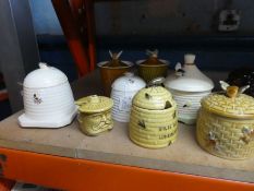 A large quantity of honey pots including Beswick, Carltonware, Sylvac, etc