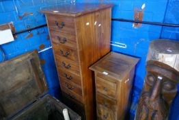 A modern Indian hardwood pillar chest having 10 drawers and two other items of furniture