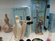 Two large Lladro figurines one of a lady in evening and the other a gentleman under a lampost