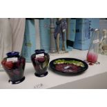 Pair of Moorcroft small vases, similar Moorcroft plate and a silver rimmed glass vase