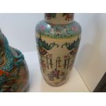 An early 20th century Chinese vase, decorated figures and vases, damage to rim, 60cm approx