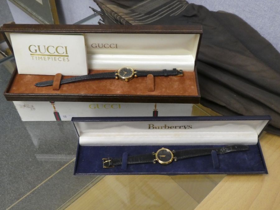 Vintage boxes Gents Gucci wristwatch and a cased Burberrys example