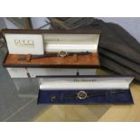 Vintage boxes Gents Gucci wristwatch and a cased Burberrys example