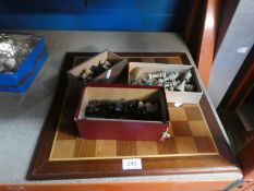 Mahogany chess board and various chess pieces
