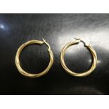 Pair of 9ct gold twisted hoop design earrings, marked 375, 2.2g approx
