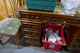A reproduction yew wood twin pedestal desk and a small reproduction side table