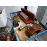 A quantity of collectables to include a cased Hohner Harmonica, a minature Steky camera in case, len