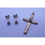 9ct yellow gold cross pendant with cubic zirconia stone and pair of 9ct gold stud earrings set clear