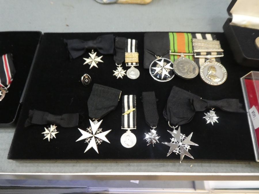A group of St John's medals to 'M M Hellaway', to include World War II Defence medal, a St John's me - Image 3 of 6