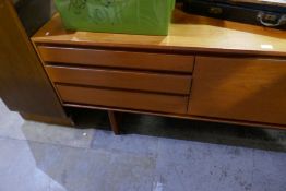 A 1970's teak sideboard by White and Newton and a glazed cabinet