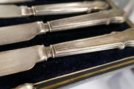A quantity of six cased silver handled knives, Sheffield 1917, Yates Brothers