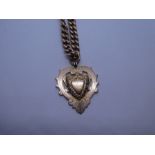 9ct yellow gold chain hung with heart shaped medallion, marked 375, with lobster claw clasp, approx