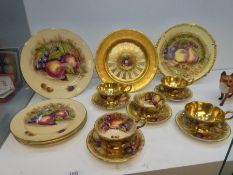 A quantity of Aynsley Orchard Gold vintage teaware (some signed with the name of the artist D Jones)