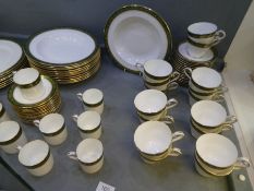 A quantity of Aynsley Chester design dinner and teaware with green and gilded border