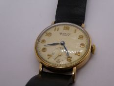 A vintage gents Resolute 9ct gold watch of good size, probably dating from the 1950s