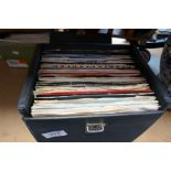 Case of single vinyl records including Blondie, Kate Bush, Bee Gees