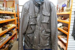 A double breasted brown leather Man's jacket