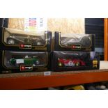 A selection of Burago model cars including Mercedes and Jaguar and a box of die-cast vehicles by Mat