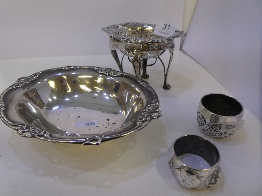 A novel Edwardian silver bon bon dish by William Hutton and Sons Ltd, with pierced floral rim, Sheff