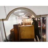 A large wooden over mantle wall mirror, 145cm approx