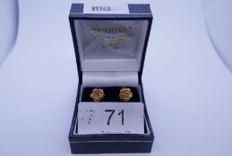 Pair of 9ct yellow gold studs in the form of rose heads, marked 9ct, approx 1.5g