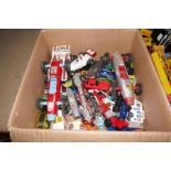 Two trays of vintage playworn die cast vehicles including construction examples