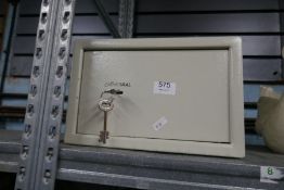 A small safe with key