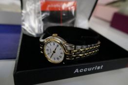 Boxed ladies Accurist watch, Tissot example and another