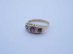 Antique 18ct yellow gold dress ring, set with rubies and diamonds central stone replacement, not rub